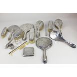 A George VI silver five-piece dressing table set, six other dressing table mirrors and brushes, a