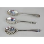 A George V silver caddy spoon, maker Mappin & Webb, Sheffield 1933, together with a Victorian silver
