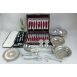 A cased set of twelve silver plated fish set, a cased lobster set, a sugar shaker, two bottle