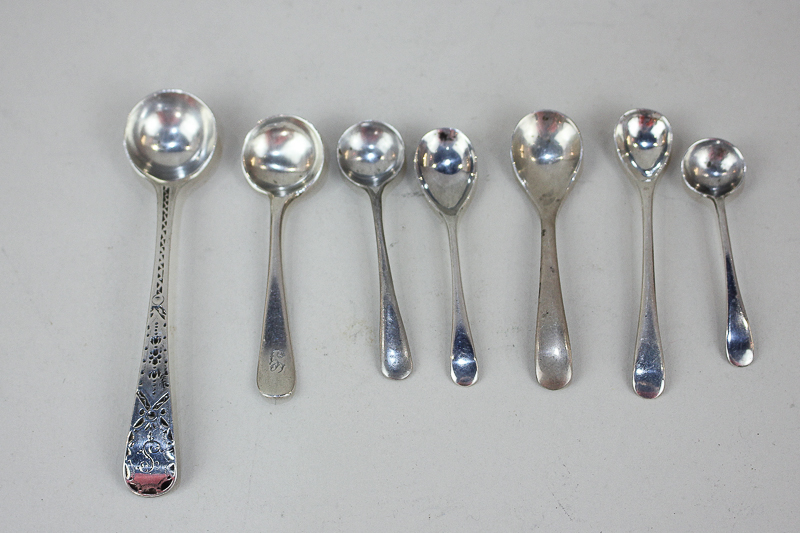 A George III silver Old English pattern condiment spoon with chased design, maker Benjamin