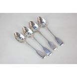 A set of four Victorian Irish silver fiddle pattern teaspoons with engraved lion terminals, Dublin