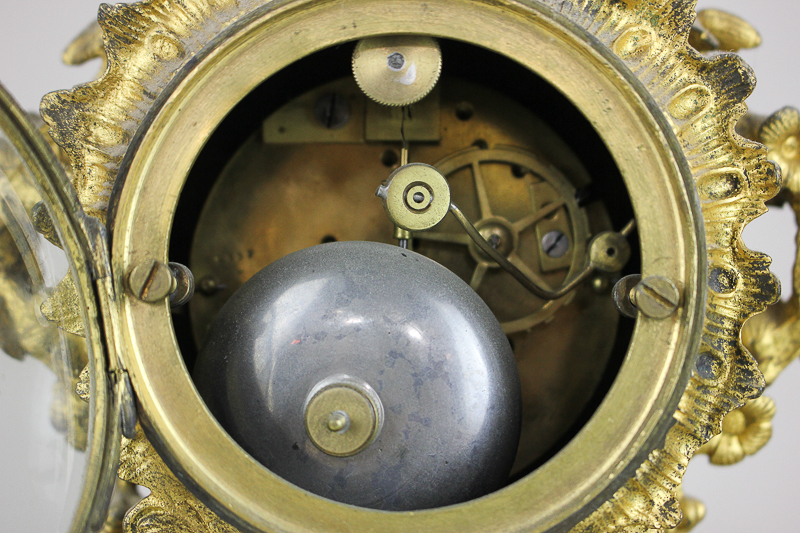 A 19th century French clock garniture, the white and blue enamel dial marked Hodgkins & Co, À Paris, - Image 2 of 2