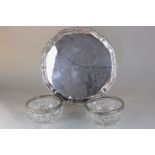 A pair of German 800 silver mounted cut glass bowls, together with a silver plated salver with