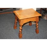 A small oak footstool with rectangular top, on spiral twist legs, 39cm