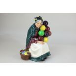 A Royal Doulton porcelain figure of the 'Old Balloon Seller' HN1315