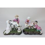 A pair of German Rudolstadt Volkstedt porcelain figure groups of a boy and a girl milking a cow