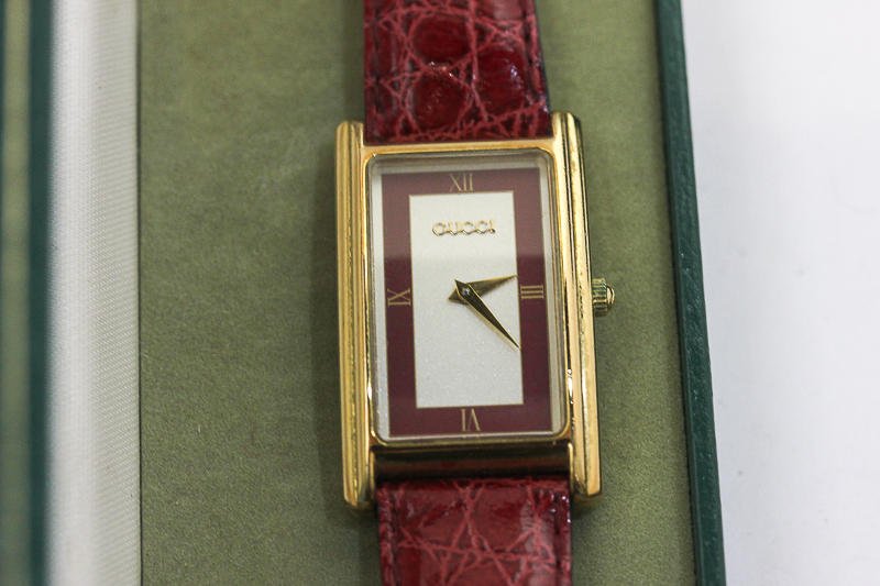 A lady's gold plated Gucci wristwatch, quartz movement, ref 2600m, in case - Image 2 of 2