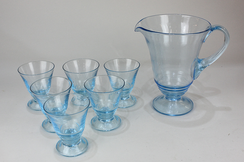 A blue glass lemonade set of jug and six glasses