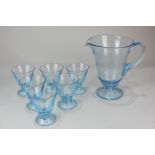 A blue glass lemonade set of jug and six glasses