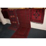 Four Turkish wool rugs and runners, all in red and blue colourway, various sizes, 100cm by 50cm,