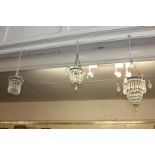 Three brass and glass chandelier light shades, largest 26cm