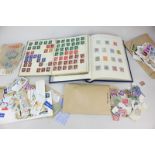 A stamp album containing British stamps, Edward VII halfpenny to one shilling, in mint condition,