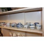 A collection of 19th century porcelain tea bowls, teacups and saucers, including English, European