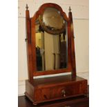 A walnut framed adjustable dressing table mirror with shaped surmount, on rectangular box base