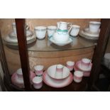 A Royal Worcester porcelain part tea service including six cups and saucers, side plates, cream jug,