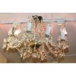 A clear glass eight branch chandelier light fitting, 30cm, (a/f - must be tested by an electrician