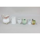 A Royal Crown Derby miniature wash jug, five other miniature jugs, and a Victorian cream jug