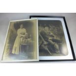 Two reproduction sepia photographs of a gardener sitting beside his tools, 43cm by 32.5cm, and a