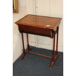 A Victorian mahogany sewing table with rectangular box top, on turned supports (a/f)