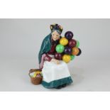 A Royal Doulton porcelain figure, The Old Balloon Seller (HN1315), 18cm high