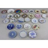 A collection of twenty-seven miniature plates and dishes, all by different makers including