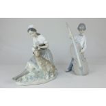 A Lladro porcelain figure of a boy playing the double bass (a/f), together with a Nao figure of a