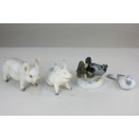 A Beswick porcelain pig, 9.5cm, a Continental porcelain bird and duck group, both with marks to