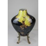 M Chin (American 20th century), arrow shape porcelain vase depicting a Native American warrior on