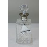 An Elizabeth II silver mounted cut glass spirit decanter, maker W. I. Broadway & Co, Birmingham,