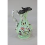 A Victorian pottery jug, marked Jones & Walley, Staffordshire No 7122, 13th May 1843, with floral
