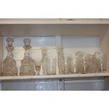 Various cut glass, to include decanters, a pair of candlesticks, and glasses