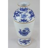 A Chinese porcelain blue and white vase depicting dragons and lotus flowers, character marks to