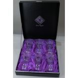 A boxed set of six Edinburgh lead crystal wine glasses (one chipped)