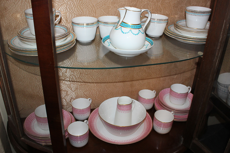 A Royal Worcester porcelain part tea service including six cups and saucers, side plates, cream jug,