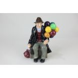 A Royal Doulton porcelain figure, The Balloon Man (HN1954), 17.5cm high