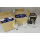 A set of twelve Waterford Crystal cut glass wine glasses in two boxes, marked Colleen, and an