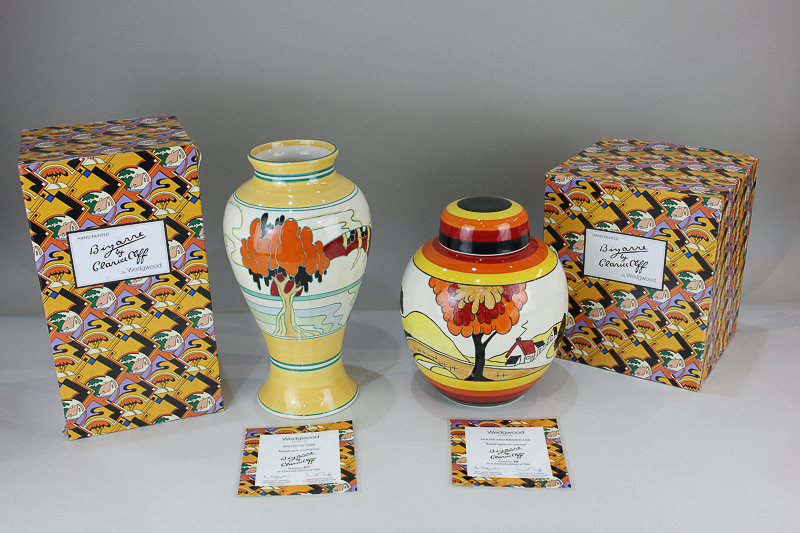 Two Wedgwood Bizarre by Clarice Cliff hand painted pieces, House and Bridge jar and cover 66/250 and