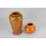 An early 20th century Lancastrian ware vase in shades of orange with gold inclusion, circa 1924 (a/