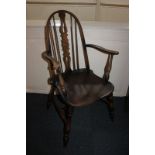 An Ercol style Windsor chair with hoop back, on turned legs