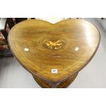 19th cent. Walnut heart shaped two tier table inlaid stringing and a central inlaid heart with