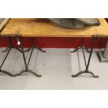 Ellis Family Archive: Small trestle table, iron legs, wooden top. 48ins. x 30½ins.