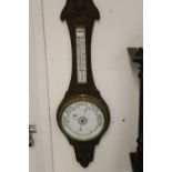 Scientific Instruments: Oak framed banjo aneroid barometer, ceramic faced.