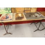 Ellis Family Archive: Large trestle table, iron legs, wooden top. 72ins. x 29ins.