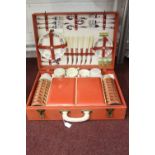 20th cent. Sirram picnic set, red synthetic covered with fitted interior, 6 place setting.