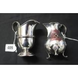Hallmarked Silver: Cream jug stepped foot rim embossed central line and wide handle Birmingham