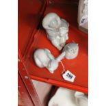 20th cent. Ceramics: Lladro Eskimo child with polar bear cub plus an unmarked rabbit and owl. (3)