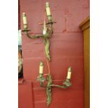 20th cent. Lighting: A pair of gilt metal 2 branch wall sconces, converted to electric.