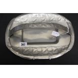 20th cent. Pewter: Archibald Knox Tudric pewter bread basket with stylised leaf design. No. 0357.