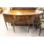 Early 20th cent. Mahogany bow front sideboard, 2 central drawers flanked by 2 cupboards, with 6