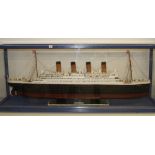 R.M.S. TITANIC: Large scratch built model of the Titanic in bespoke perspex case. 66ins. x 25ins.